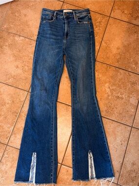 Women’s Dark Blue Boot Cut Jeans with Raw Hem